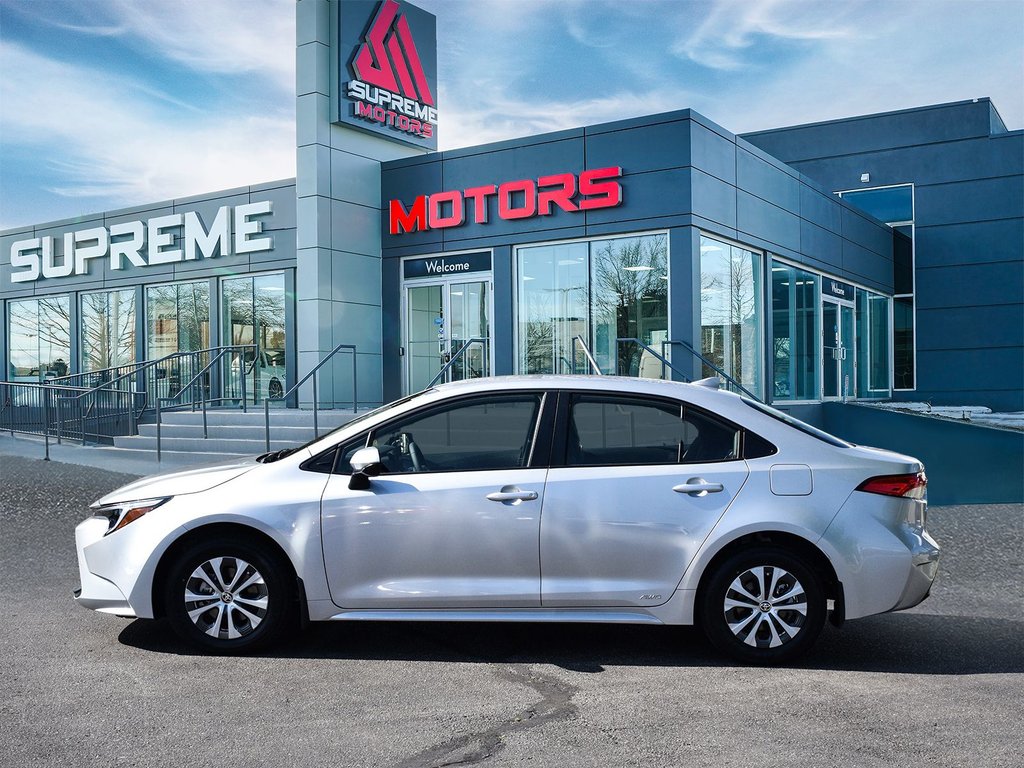 2025 Toyota COROLLA HYBRID LE AWD in Mississauga, Ontario - 4 - w1024h768px