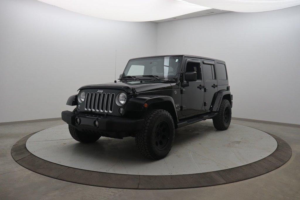 2016 Jeep Wrangler Unlimited Sahara in Jonquière, Quebec - 1 - w1024h768px