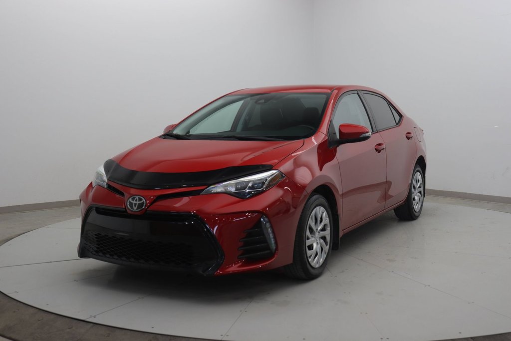 2019 Toyota Corolla in Jonquière, Quebec - 1 - w1024h768px