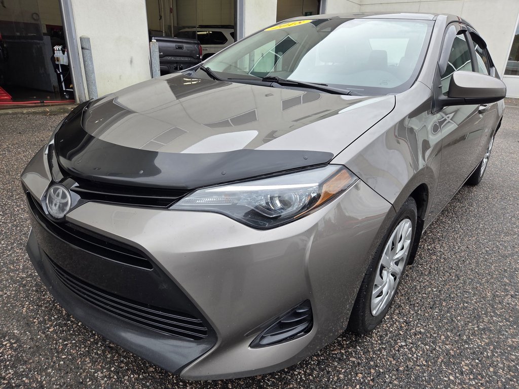 2018 Toyota Corolla LE (A/C) in Mont-Laurier, Quebec - 1 - w1024h768px