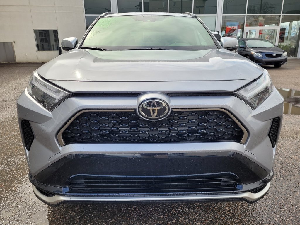Toyota RAV4 HYBRIDE RECHARGEABLE SE 2025 à Mont-Laurier, Québec - 2 - w1024h768px