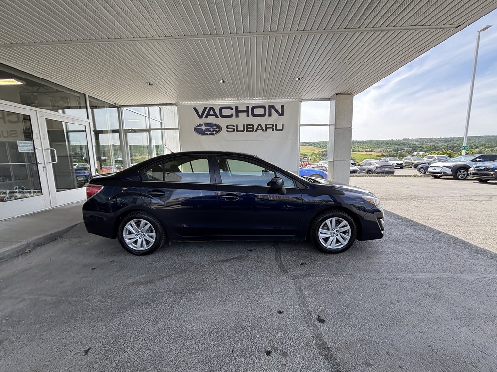 2015 Subaru Impreza 4dr Sdn CVT 2.0i w-Touring Pkg in Saint-Georges, Quebec - 2 - w1024h768px