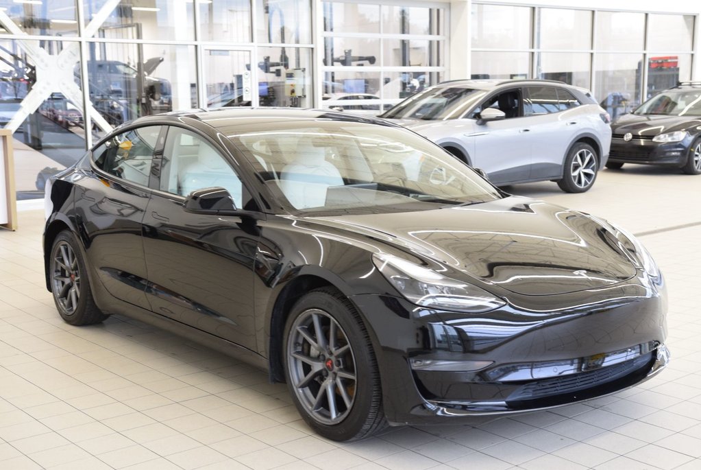 Tesla Model 3 SR+CUIR BLANC+PPF INCLUS 2022 à Laval, Québec - 12 - w1024h768px