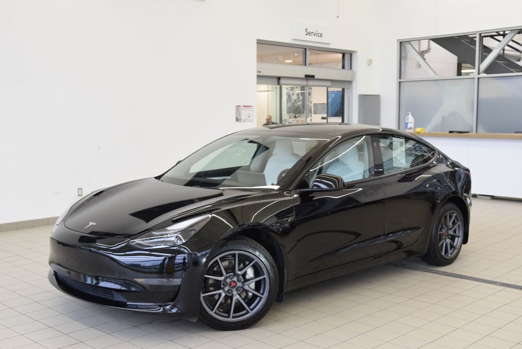 Tesla Model 3 SR+CUIR BLANC+PPF INCLUS 2022 à Laval, Québec - 1 - w1024h768px