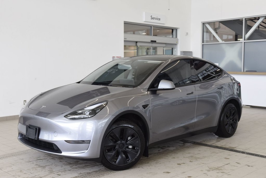 2025 Tesla Model Y LONG RANGE+QUICKSILVER GREY in Laval, Quebec - 1 - w1024h768px