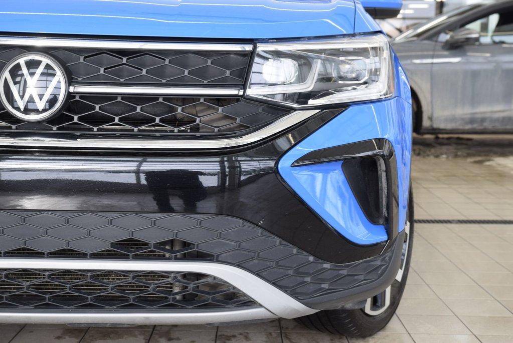 2022 Volkswagen Taos HIGHLINE+DRIVER ASSIST+AWD in Laval, Quebec - 20 - w1024h768px