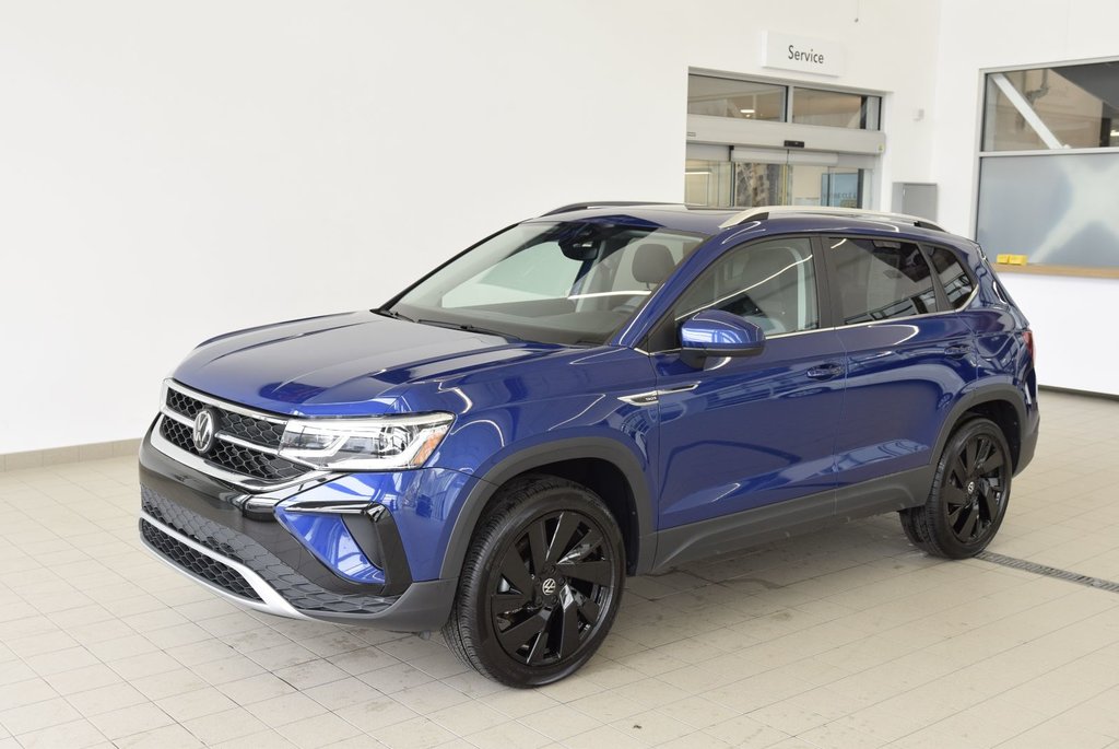 2023  Taos HIGHLINE+4MOTION+AWD+TOIT+CUIR in Laval, Quebec - 13 - w1024h768px