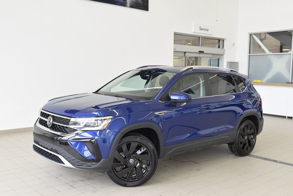 2023  Taos HIGHLINE+4MOTION+AWD+TOIT+CUIR in Laval, Quebec - 1 - w1024h768px