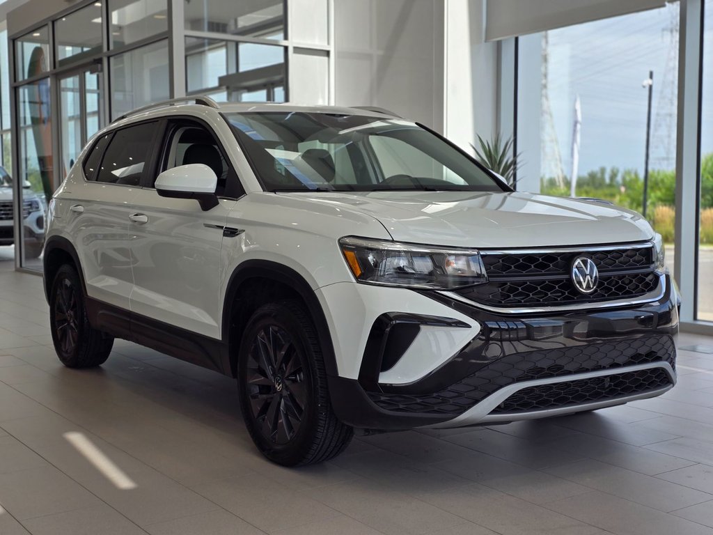 Volkswagen Taos Comfortline CUIR | CARPLAY | CAMÉRA | 1,5TSI +++ 2023 à Laval, Québec - 1 - w1024h768px