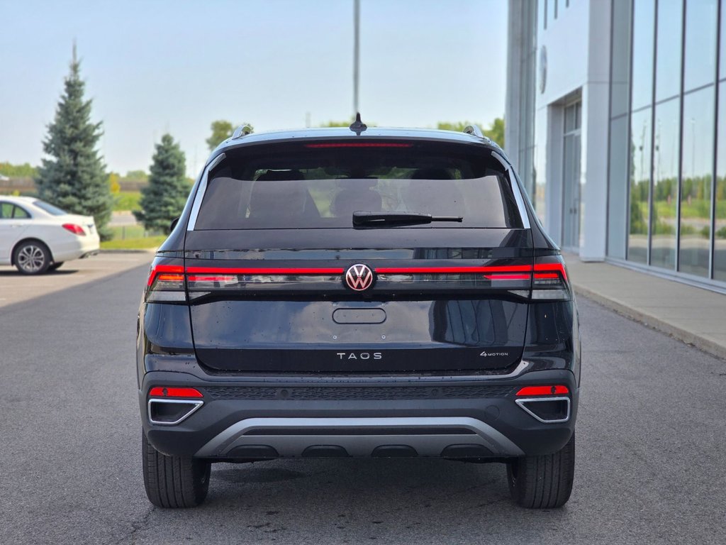 2026 Volkswagen Taos Highline 4MOTION in Laval, Quebec - 5 - w1024h768px