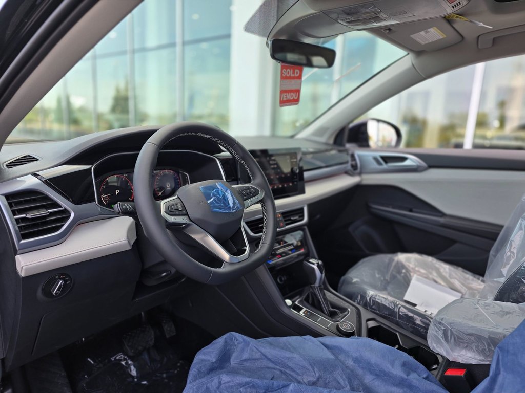 2026 Volkswagen Taos Highline 4MOTION in Laval, Quebec - 7 - w1024h768px