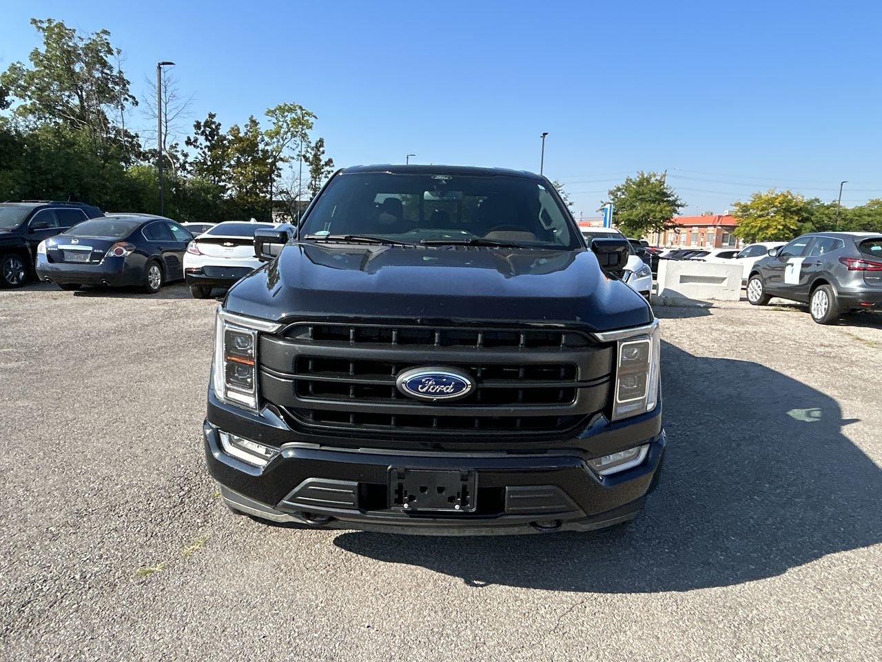 Used 2021 Agate Black Ford 4x4 - Supercrew Lariat - 145 WB image 2