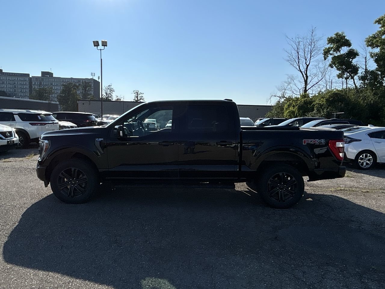 Used 2021 Agate Black Ford 4x4 - Supercrew Lariat - 145 WB image 5