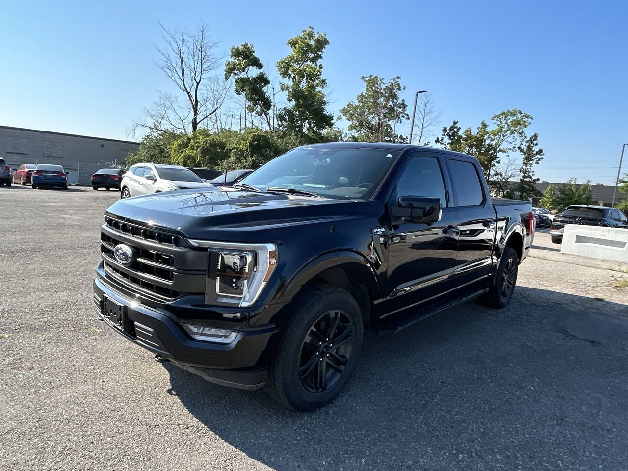 Used 2021 Agate Black Ford 4x4 - Supercrew Lariat - 145 WB image 4