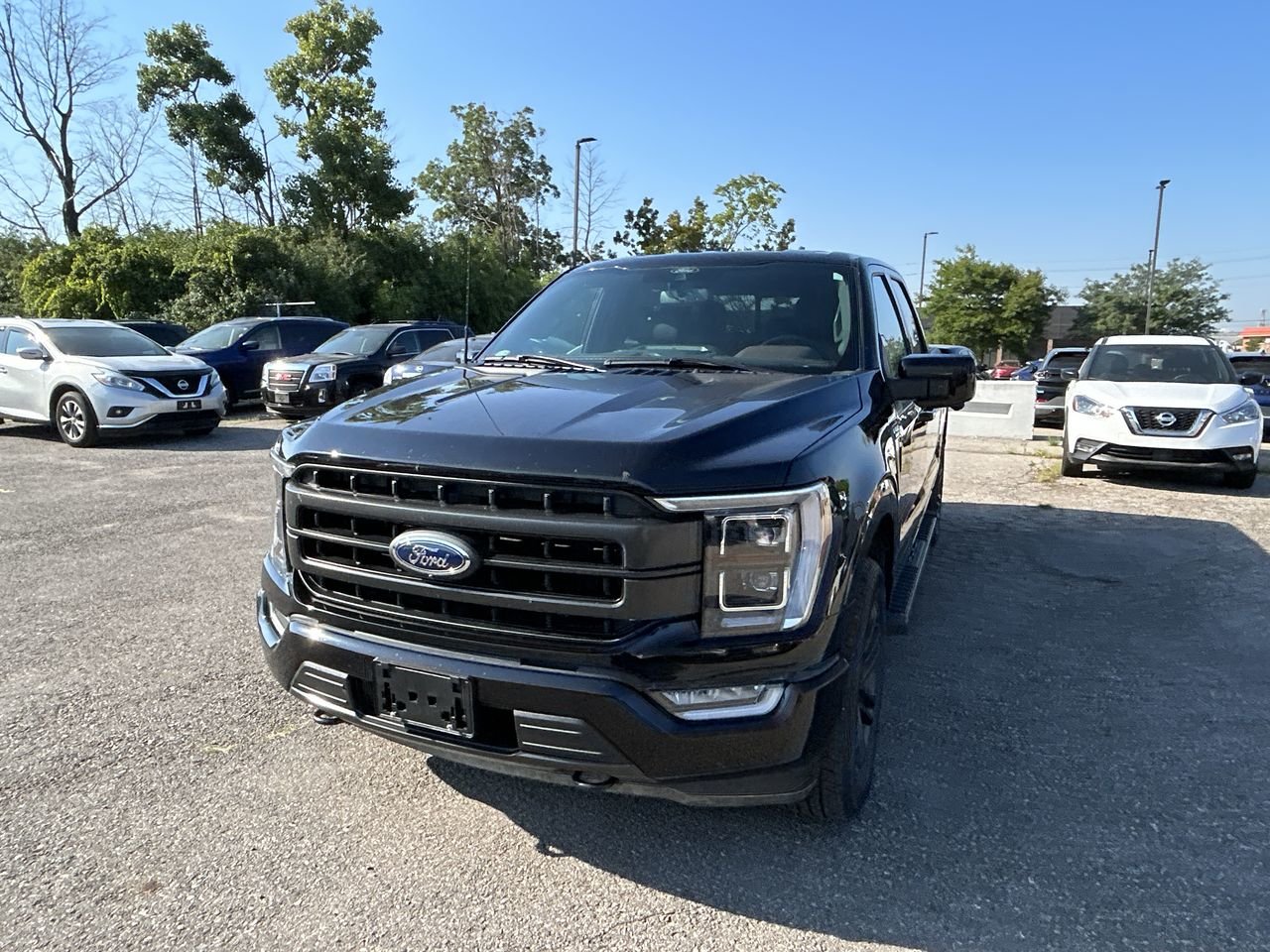 Used 2021 Agate Black Ford 4x4 - Supercrew Lariat - 145 WB image 3