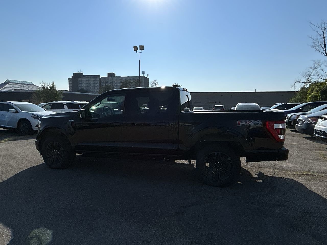 Used 2021 Agate Black Ford 4x4 - Supercrew Lariat - 145 WB image 6