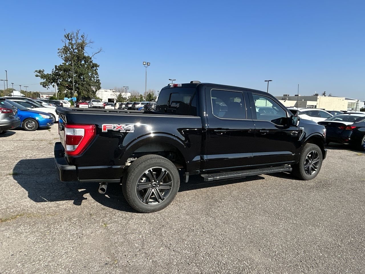 Used 2021 Agate Black Ford 4x4 - Supercrew Lariat - 145 WB image 12