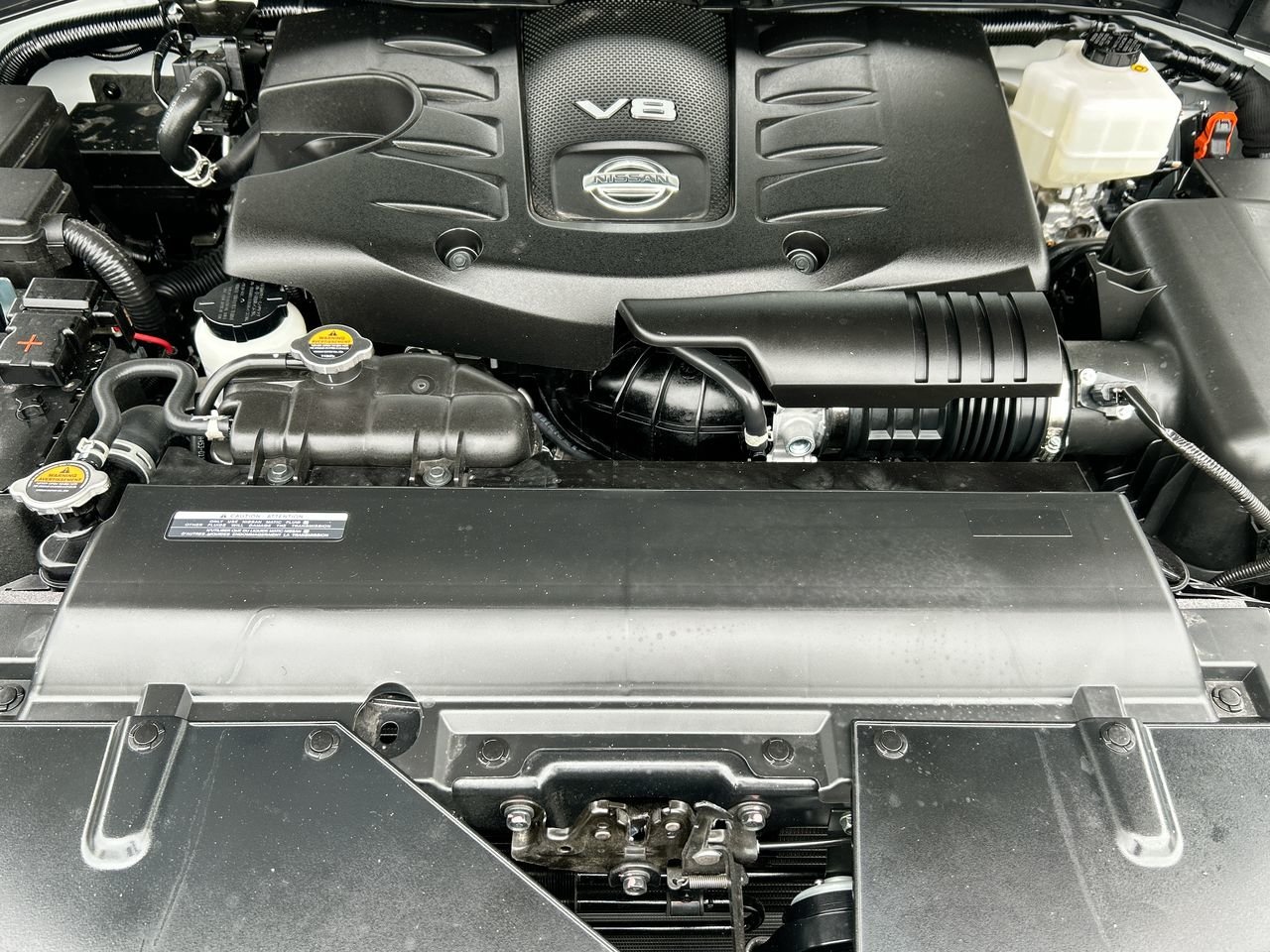 New 2023 Aspen White Tricoat Nissan Platinum Captain