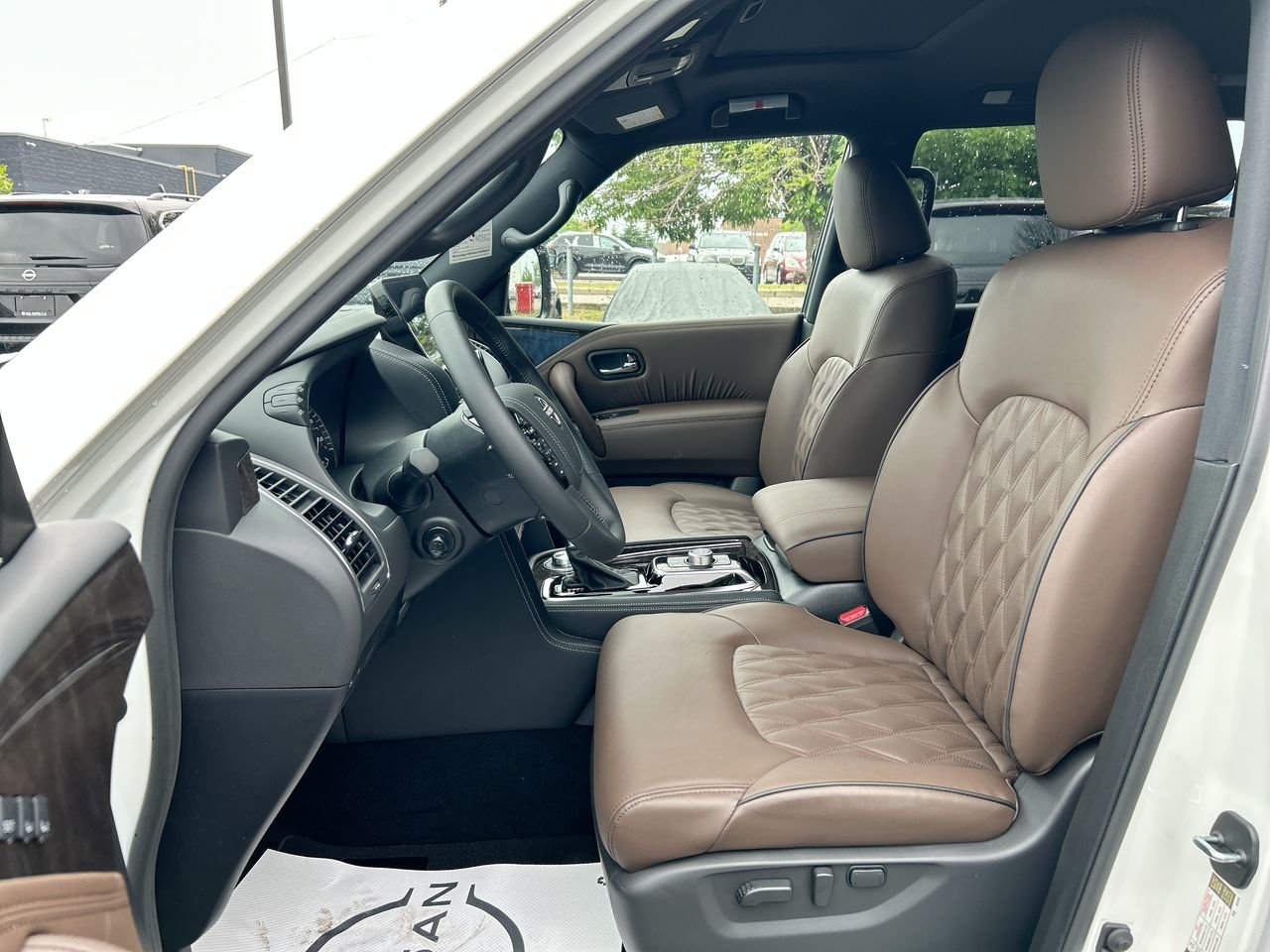 New 2023 Aspen White Tricoat Nissan Platinum Captain