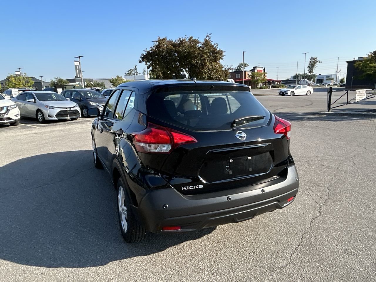 Used 2020 Super Black Nissan S CVT image 8
