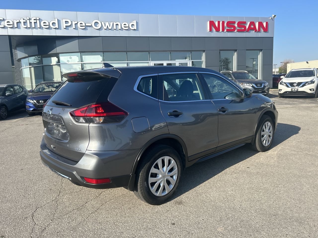 Used 2018 Gun Metallic Met Nissan S AWD CVT image 7