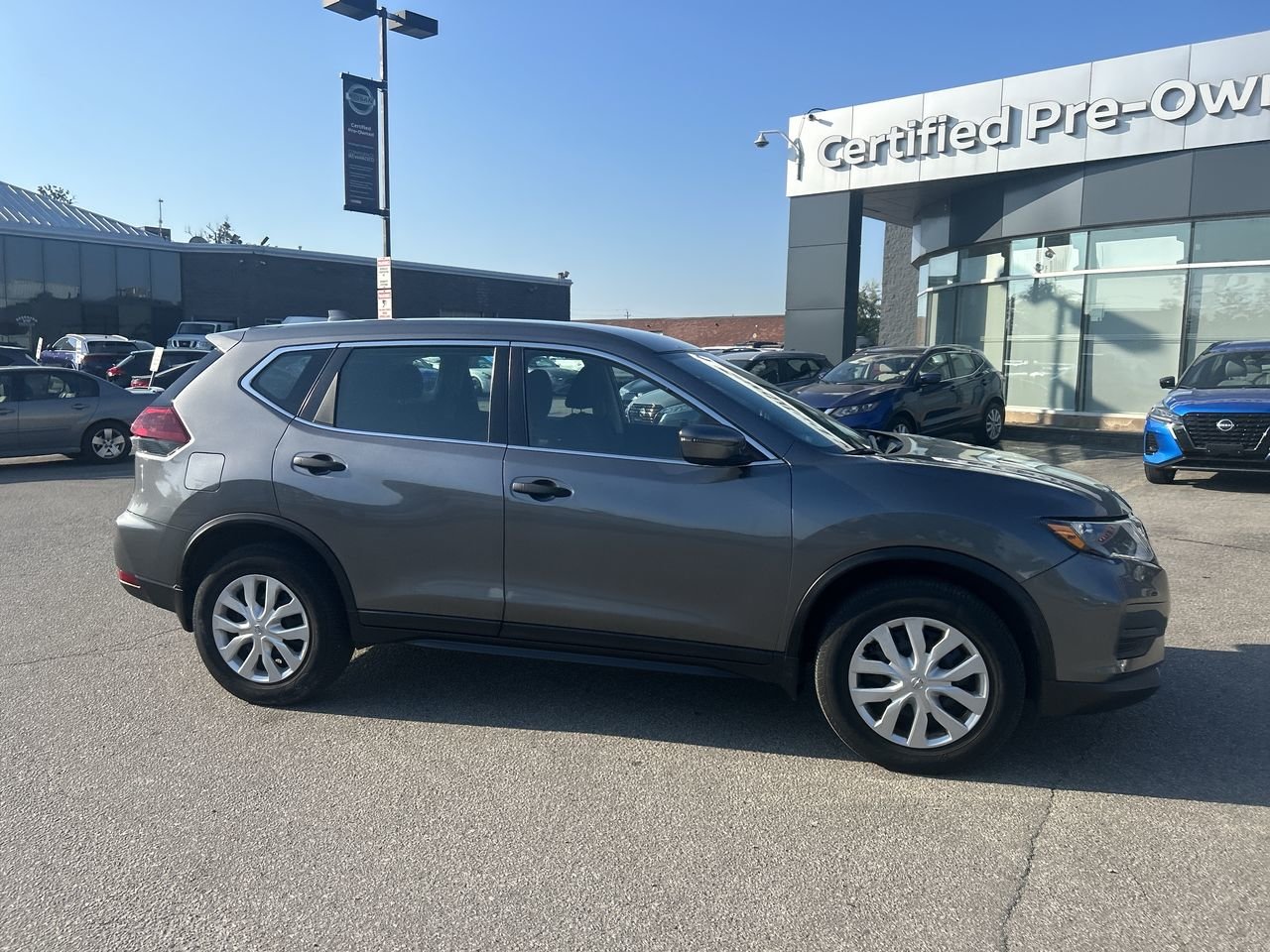 Used 2018 Gun Metallic Met Nissan S AWD CVT image 10
