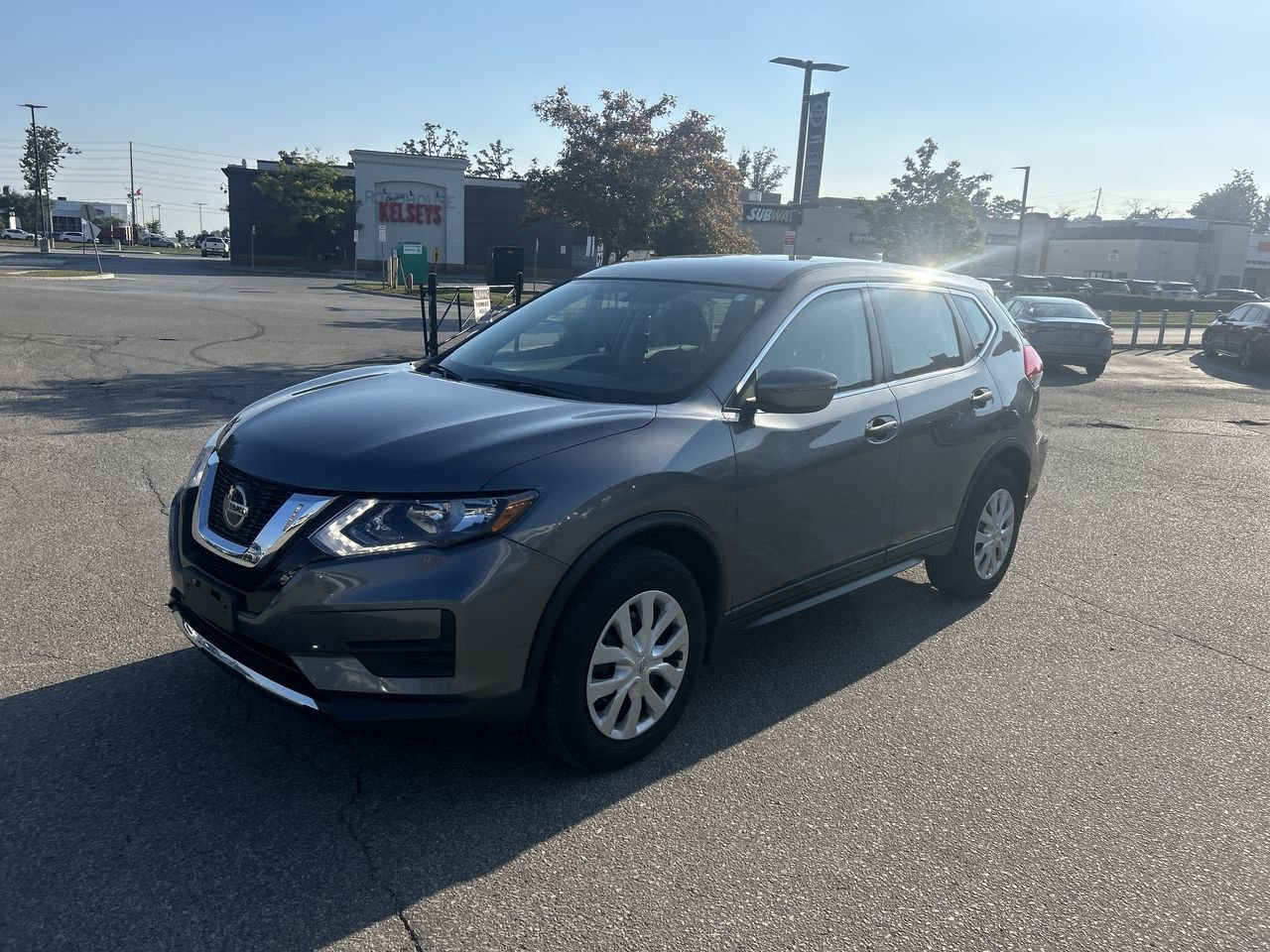 Used 2018 Gun Metallic Met Nissan S AWD CVT image 15