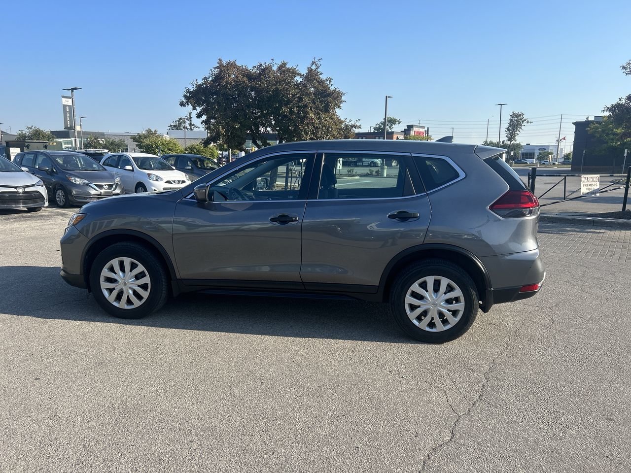 Used 2018 Gun Metallic Met Nissan S AWD CVT image 17