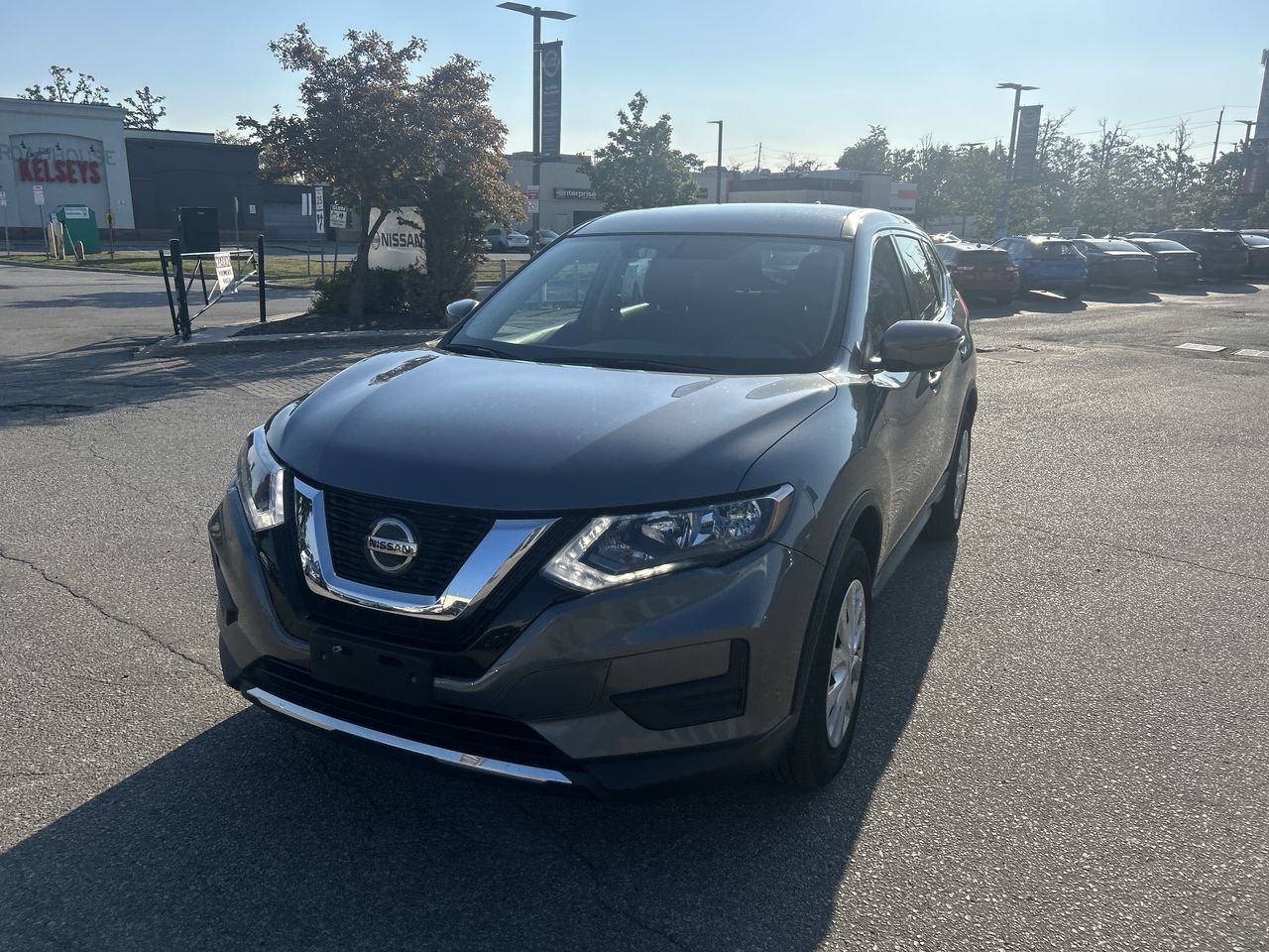 Used 2018 Gun Metallic Met Nissan S AWD CVT image 14