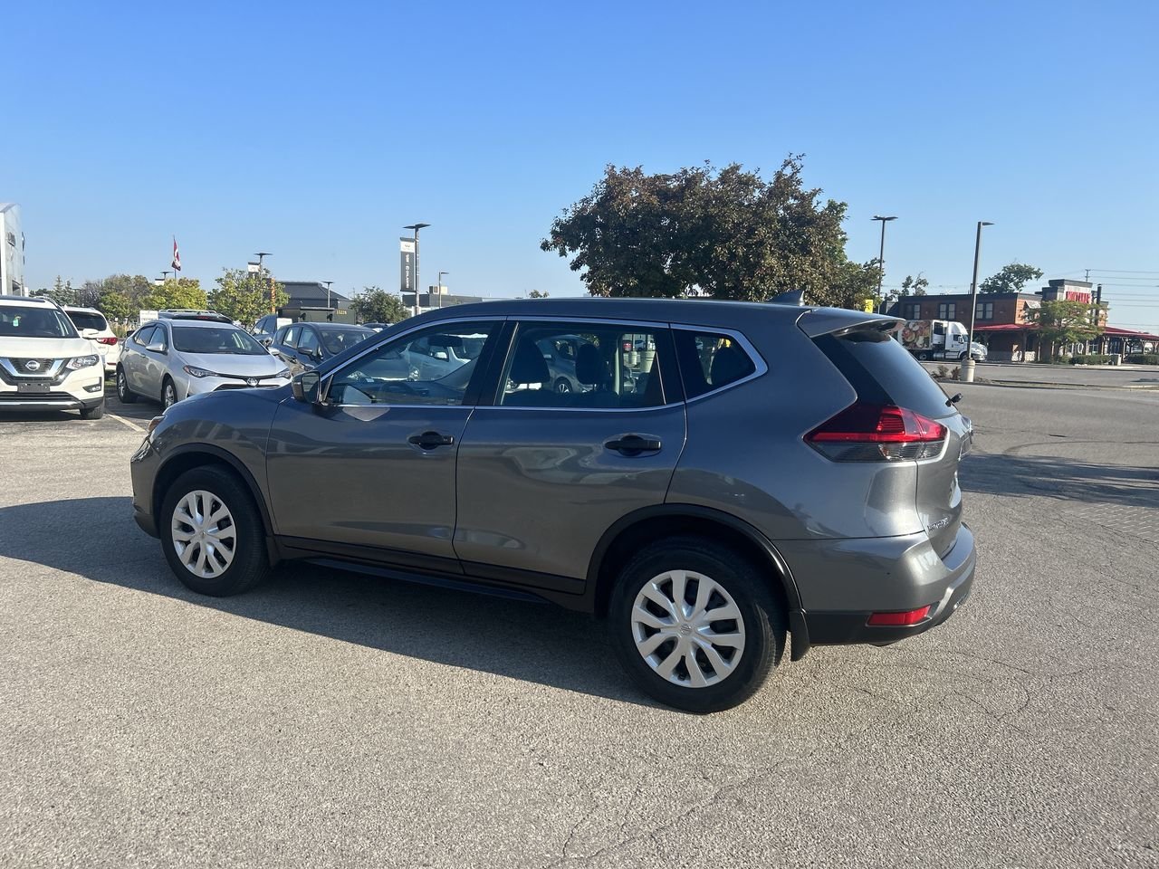 Used 2018 Gun Metallic Met Nissan S AWD CVT image 2