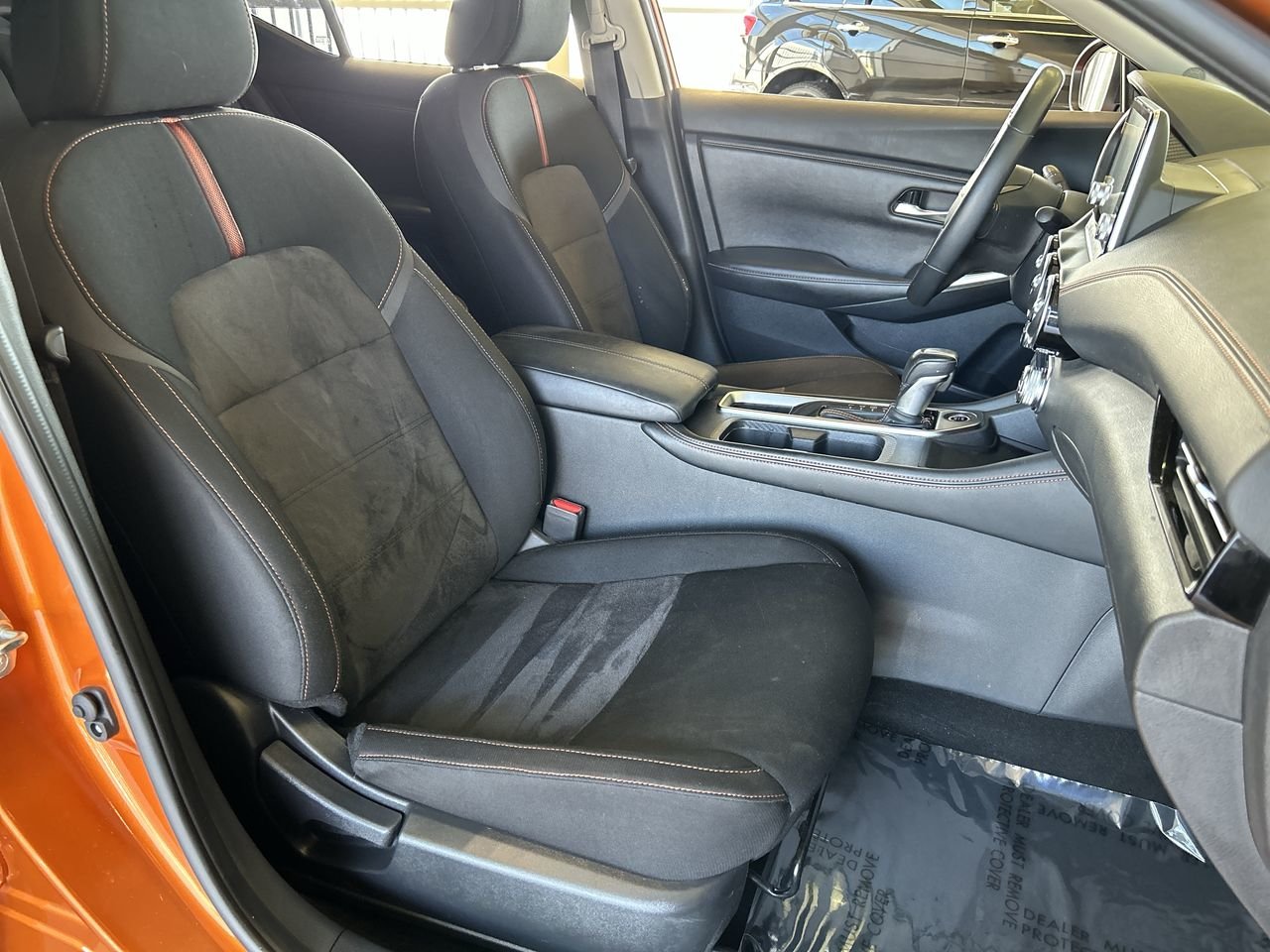 Used 2022 2 tone Super Black/Monarch Orange Met Nissan SR CVT image 32