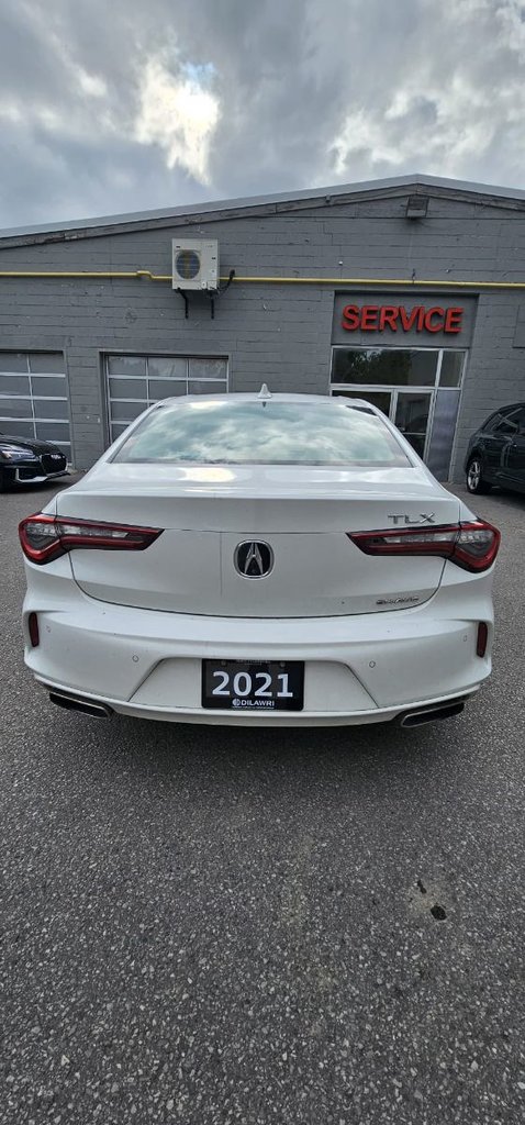 Used 2021 white Acura SH-AWD Platinum Elite image 4