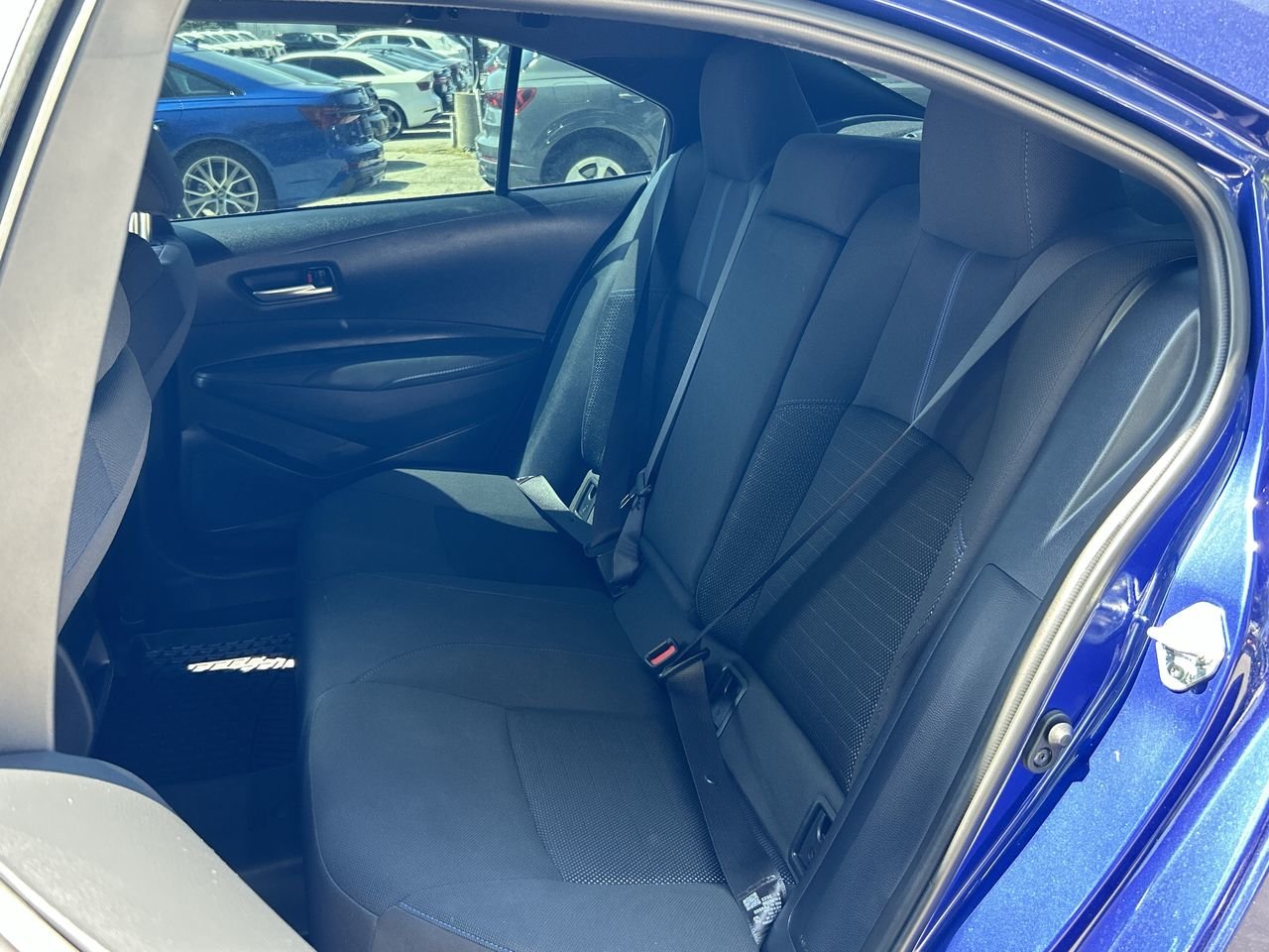 Used 2022 Blue Crush Metallic Toyota SE image 29