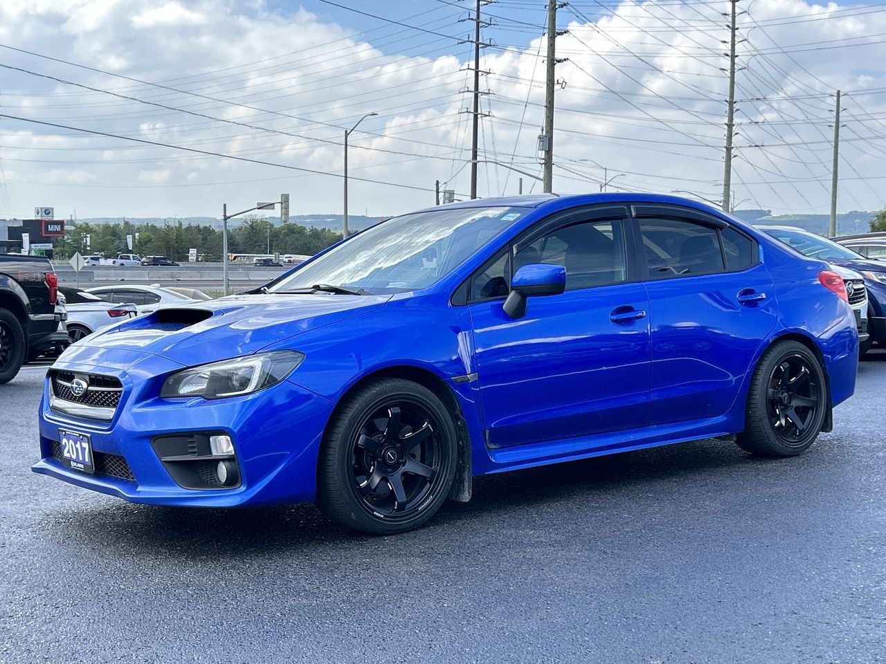 Used 2017 World Rally Blue Pearl Subaru 4Dr Sport Pkg 6sp image 3