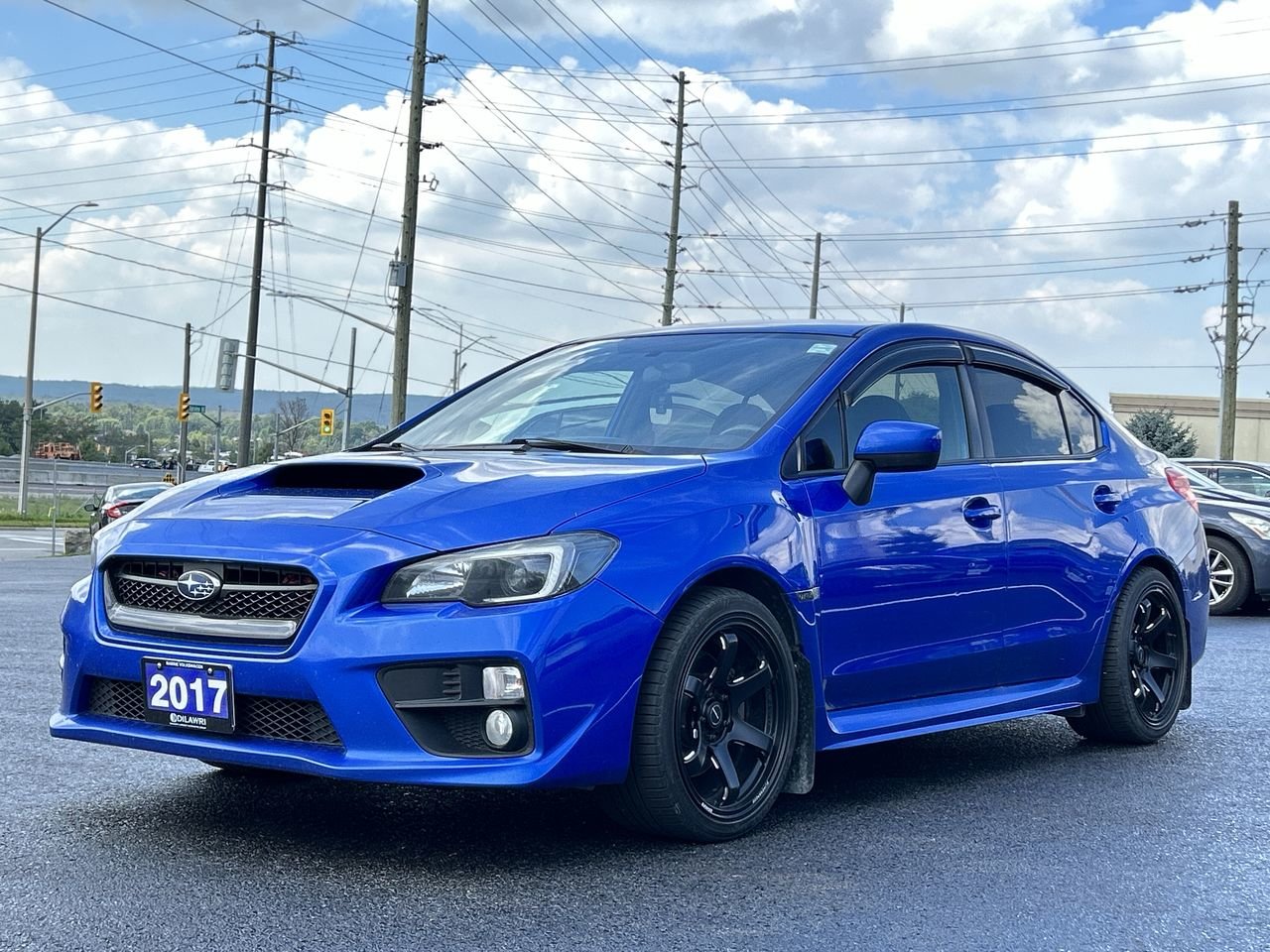Used 2017 World Rally Blue Pearl Subaru 4Dr Sport Pkg 6sp image 2