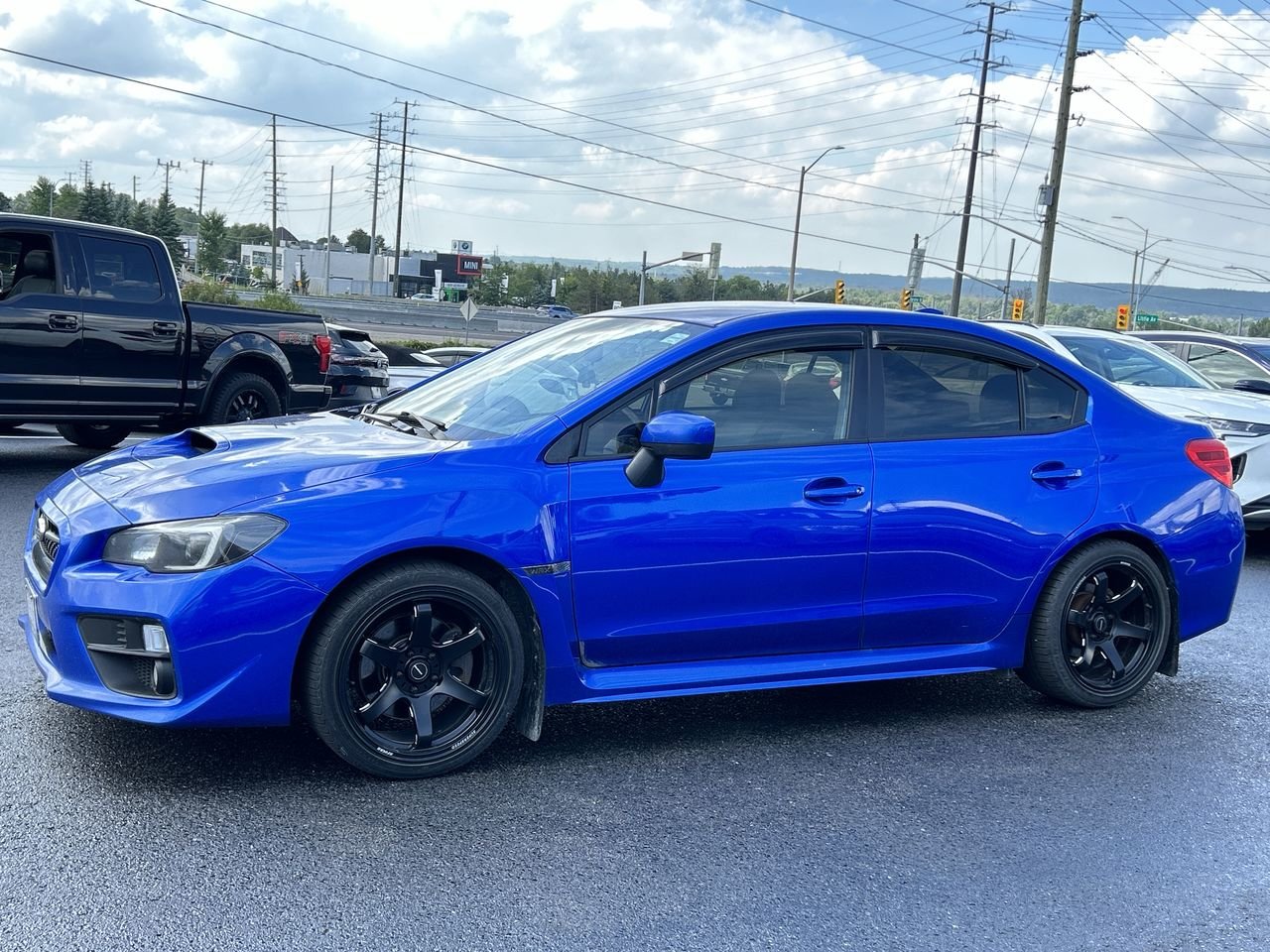 Used 2017 World Rally Blue Pearl Subaru 4Dr Sport Pkg 6sp image 4