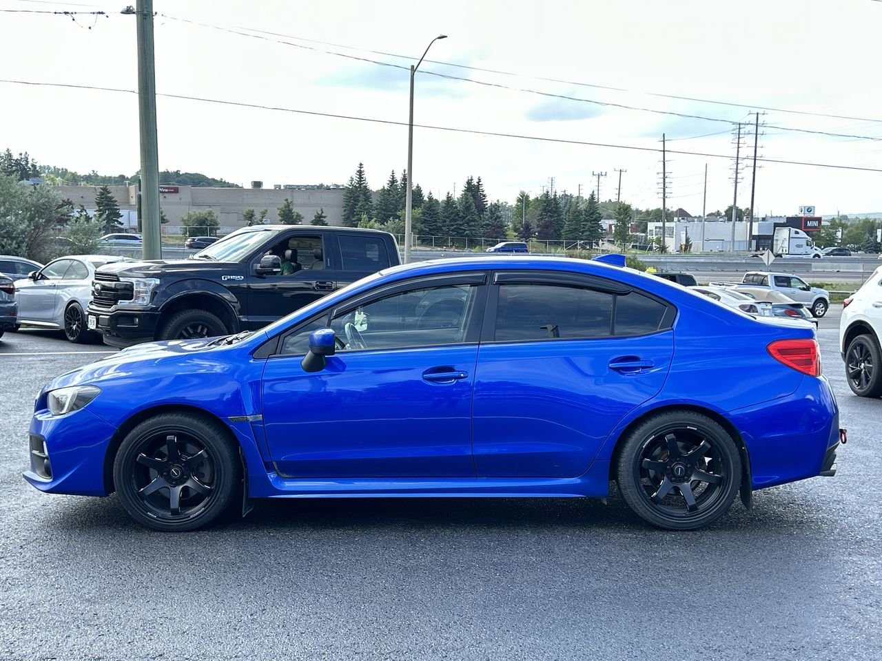 Used 2017 World Rally Blue Pearl Subaru 4Dr Sport Pkg 6sp image 5