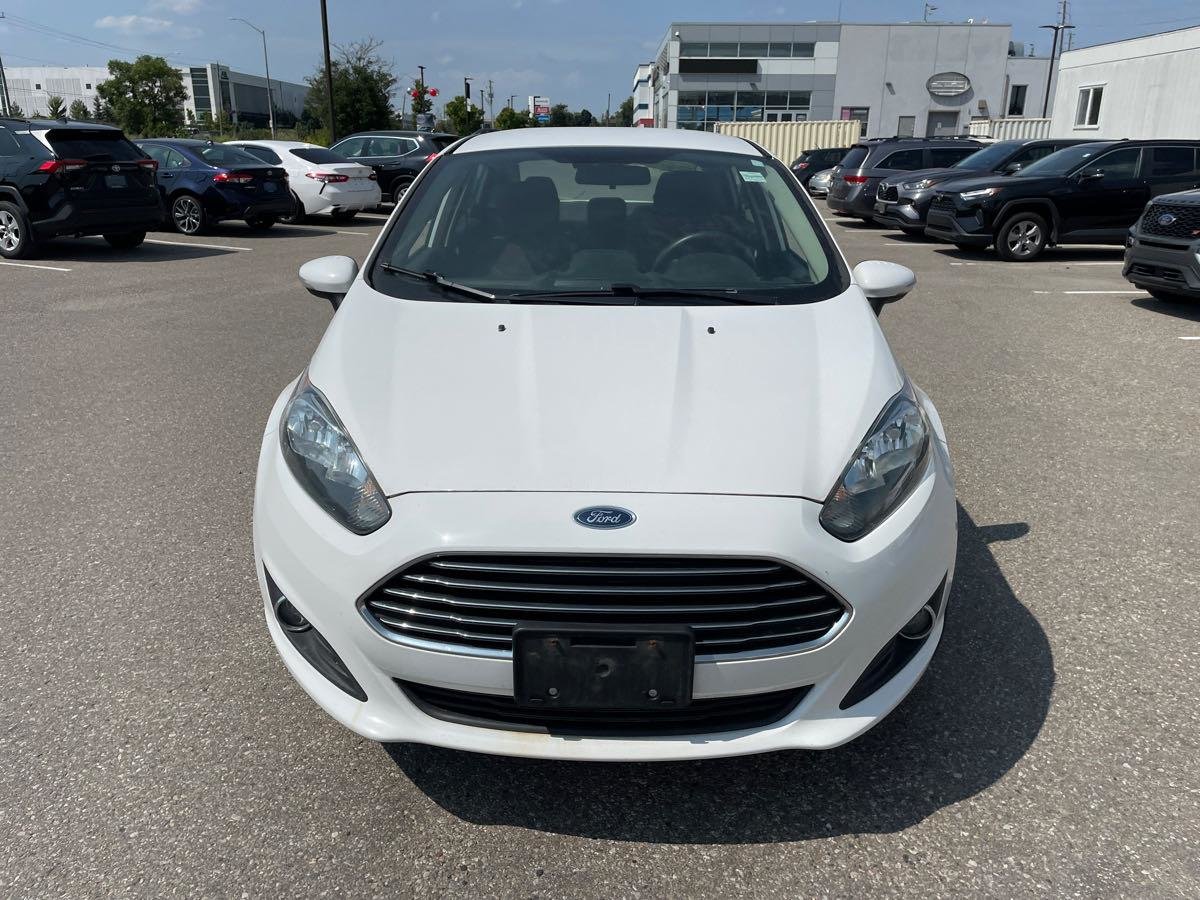 Used 2015 white Ford (4) SE image 5