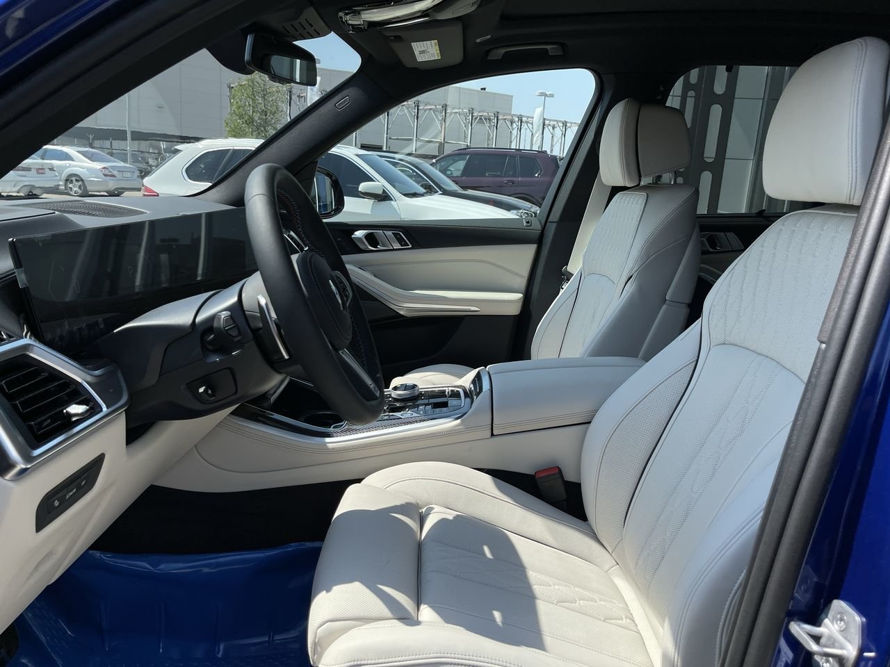New 2024 Marina Bay Blue Metallic BMW M60i image 20