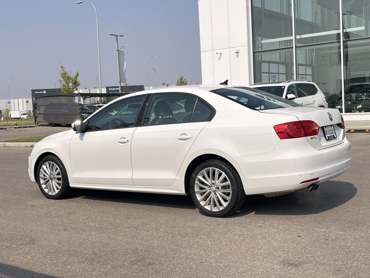 Used 2011 Candy White Volkswagen Sportline image 6