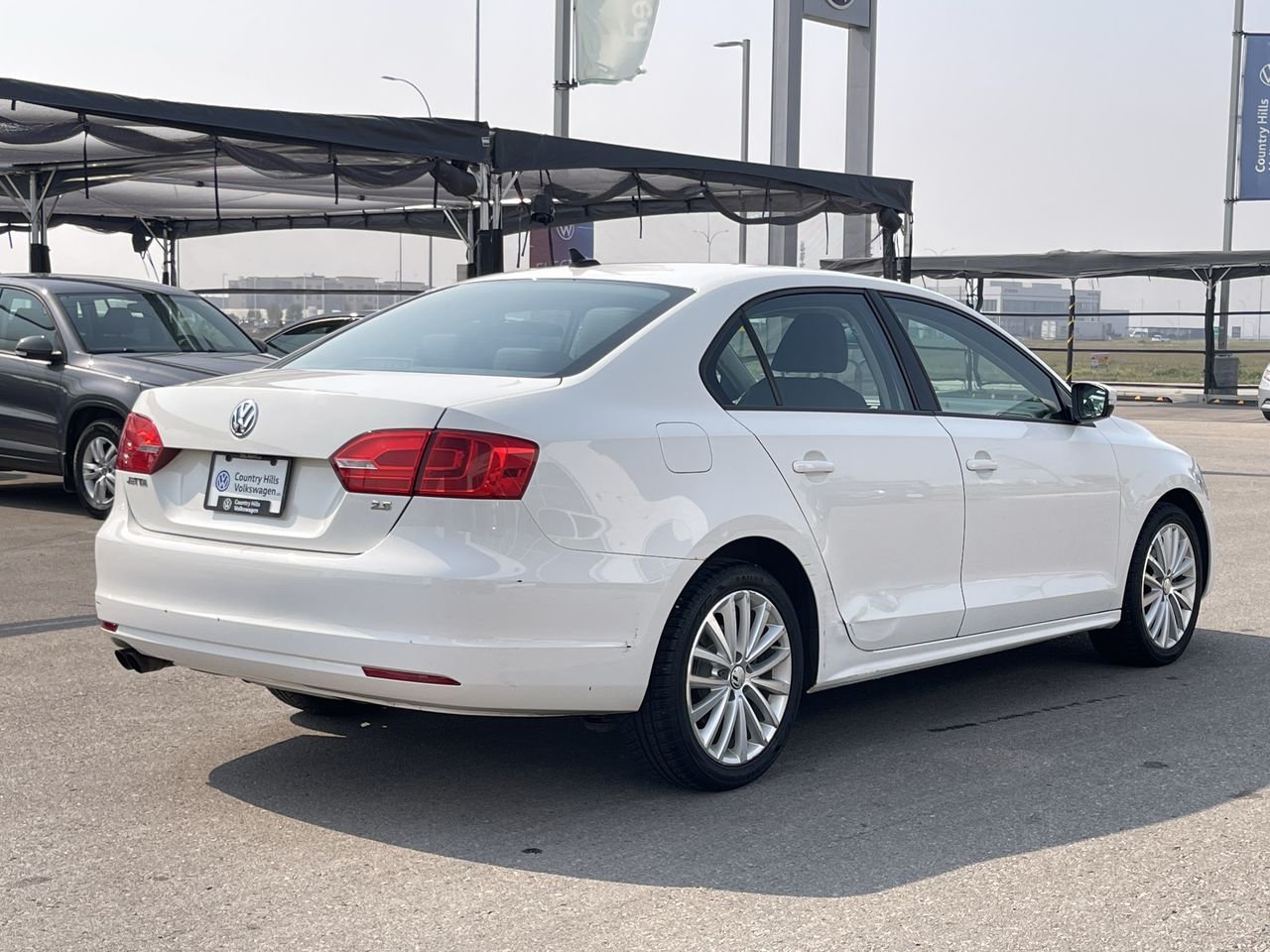 Used 2011 Candy White Volkswagen Sportline image 11