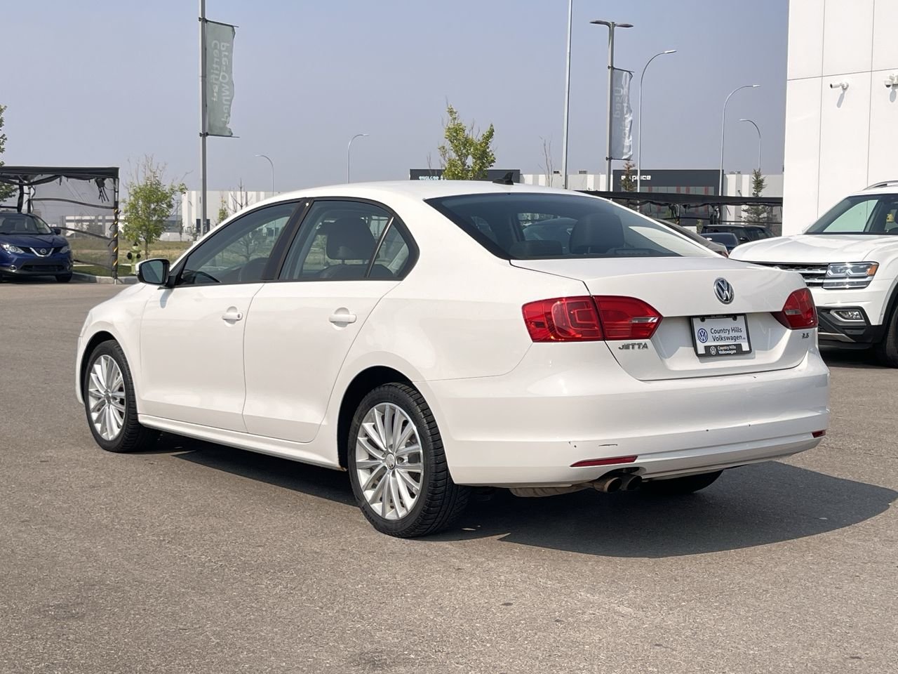 Used 2011 Candy White Volkswagen Sportline image 7