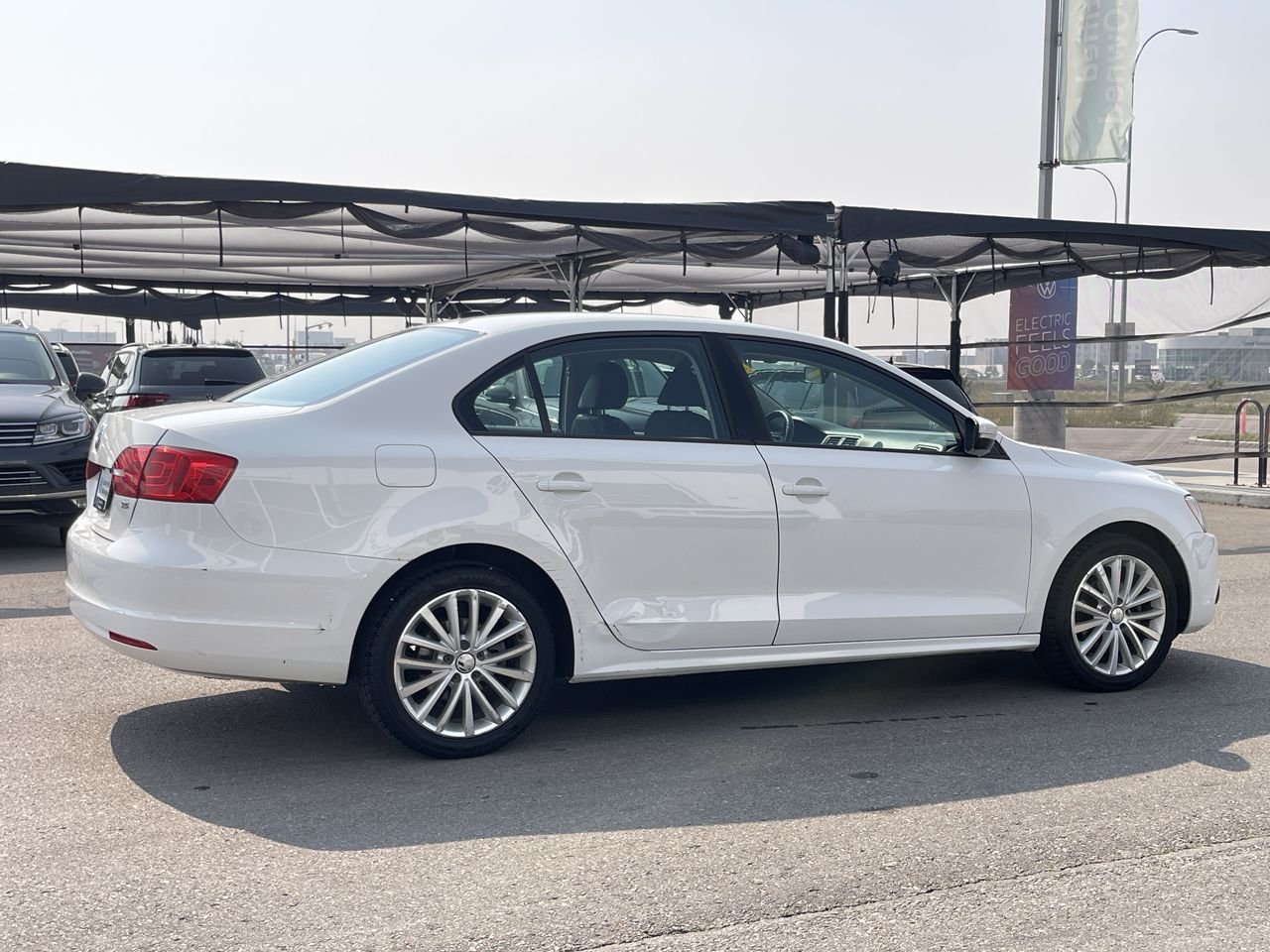Used 2011 Candy White Volkswagen Sportline image 12