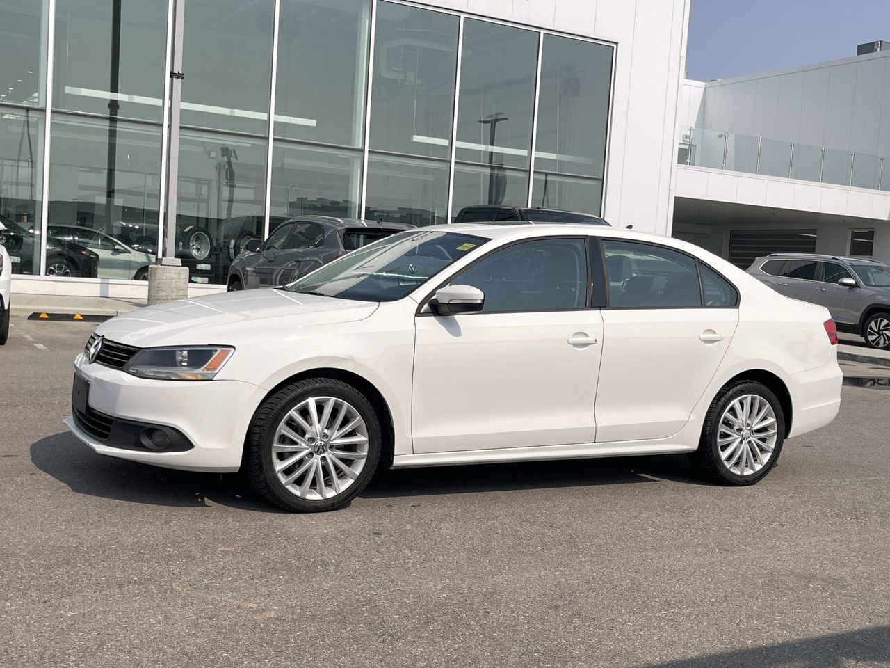 Used 2011 Candy White Volkswagen Sportline image 4