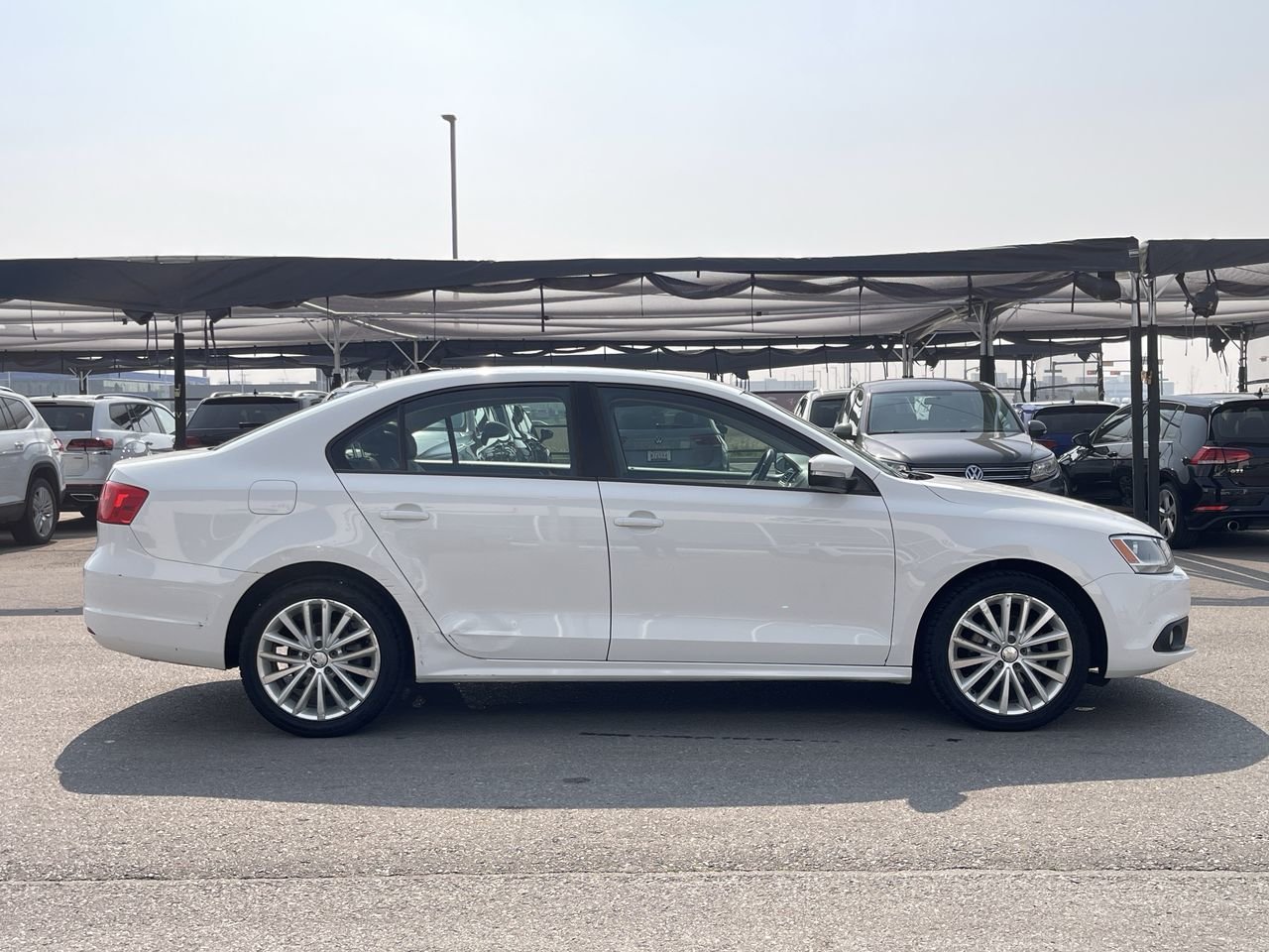 Used 2011 Candy White Volkswagen Sportline image 13