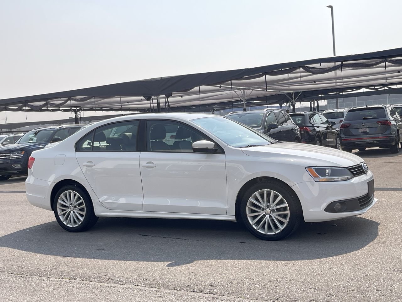 Used 2011 Candy White Volkswagen Sportline image 14