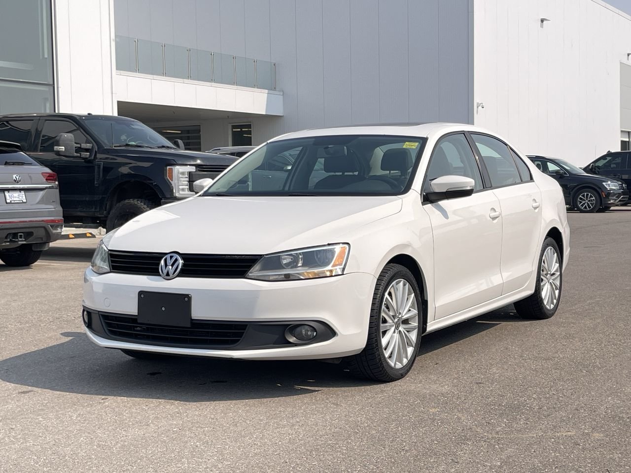 Used 2011 Candy White Volkswagen Sportline image 2