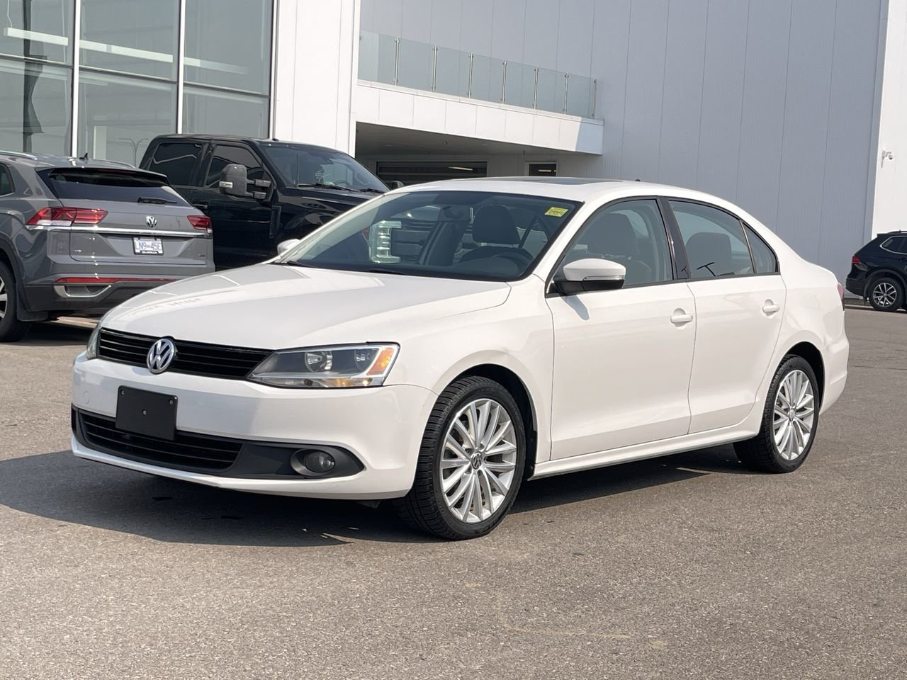 Used 2011 Candy White Volkswagen Sportline image 3