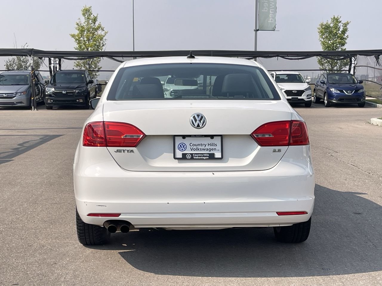 Used 2011 Candy White Volkswagen Sportline image 9