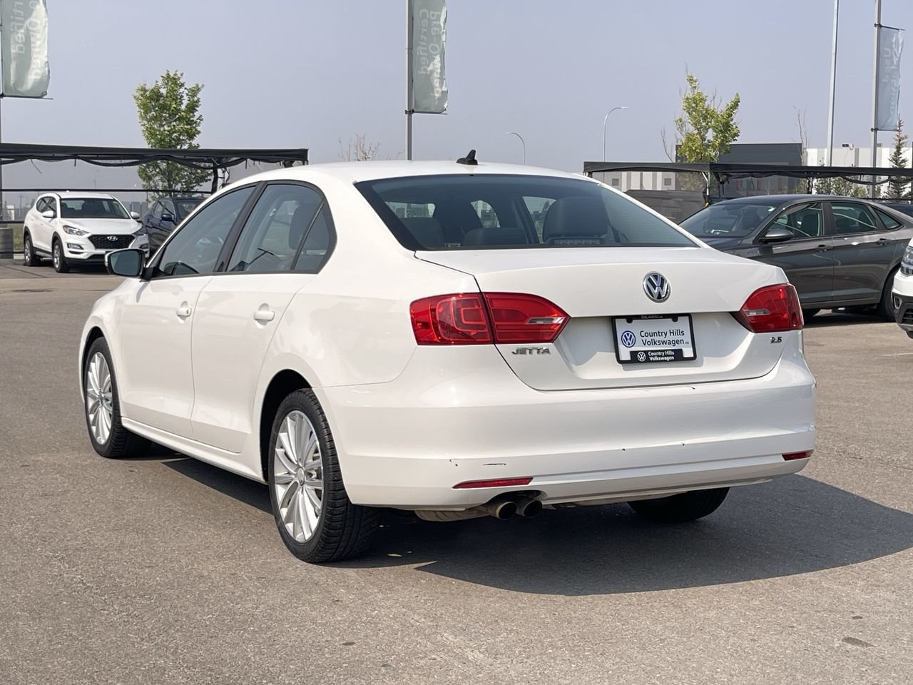 Used 2011 Candy White Volkswagen Sportline image 8